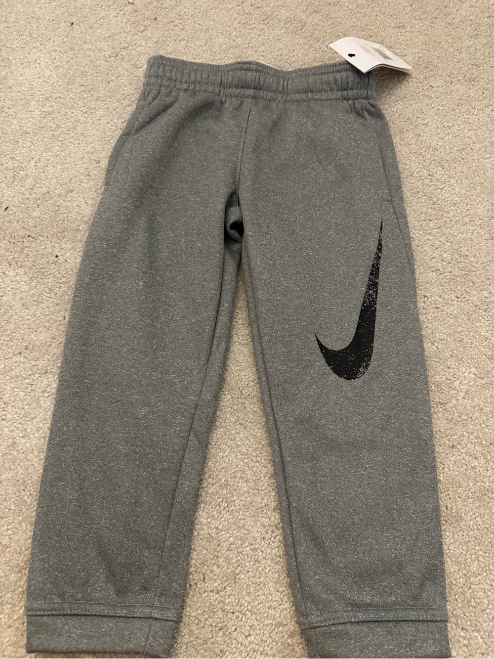 Nike Kids Gray Jogger Pants with Black Swoosh